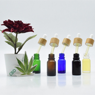 Sativa葉の花CBDの色オイルの苦痛制御10ml 20ml黒の点滴器のガラス ビンCBDオイル